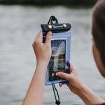 Person capturing a photo with the waterproof cell phone case | Lifestyle
